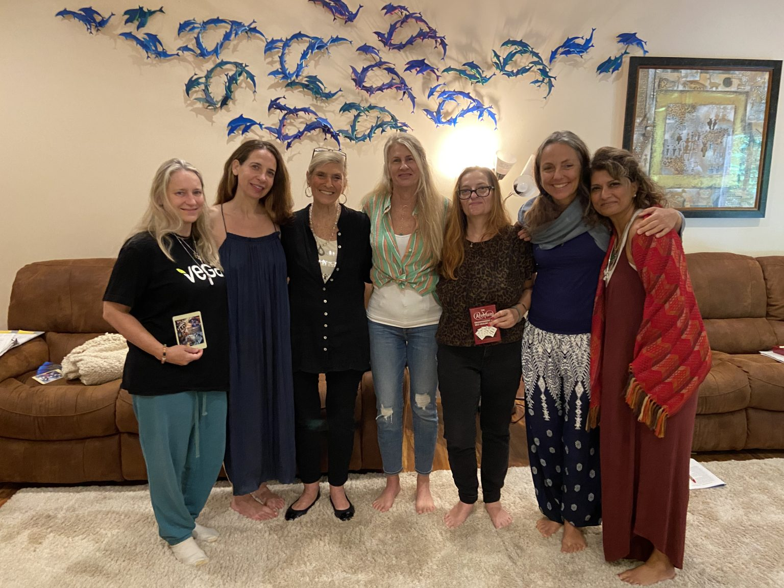 Students practicing channeling techniques during spiritual training at Delphi University